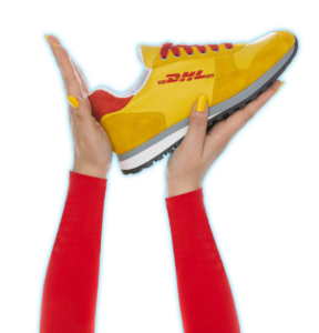 Image of DHL sneakers held aloft by two hands for Promo Sneakers. Promo Sneakers.com